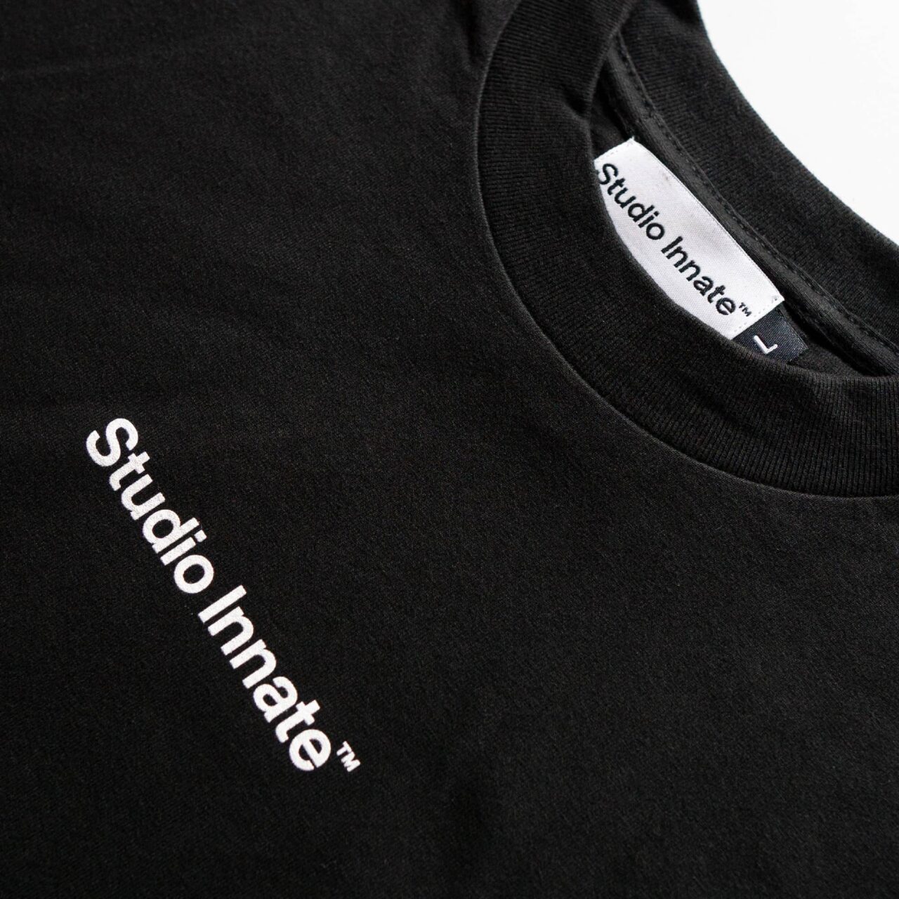 Luxury Black Studio Innate Branded T-Shirt | Official Merchandise